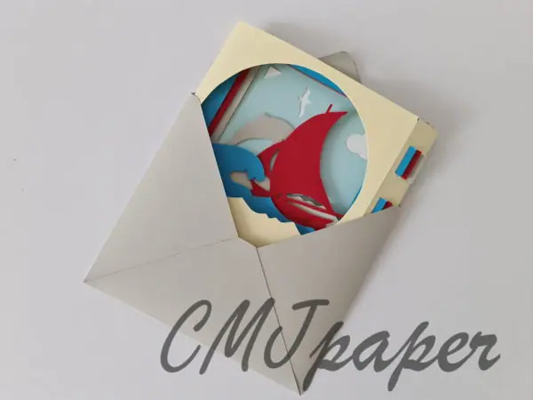 carte kirigami bateau papier découpé