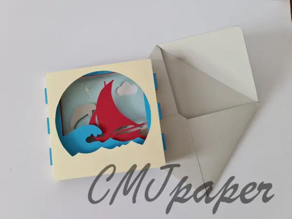 carte kirigami bateau papier découpé