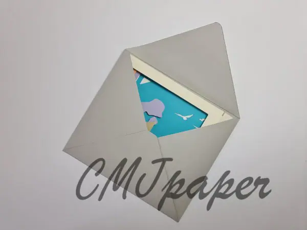 carte kirigami plage papier découpé